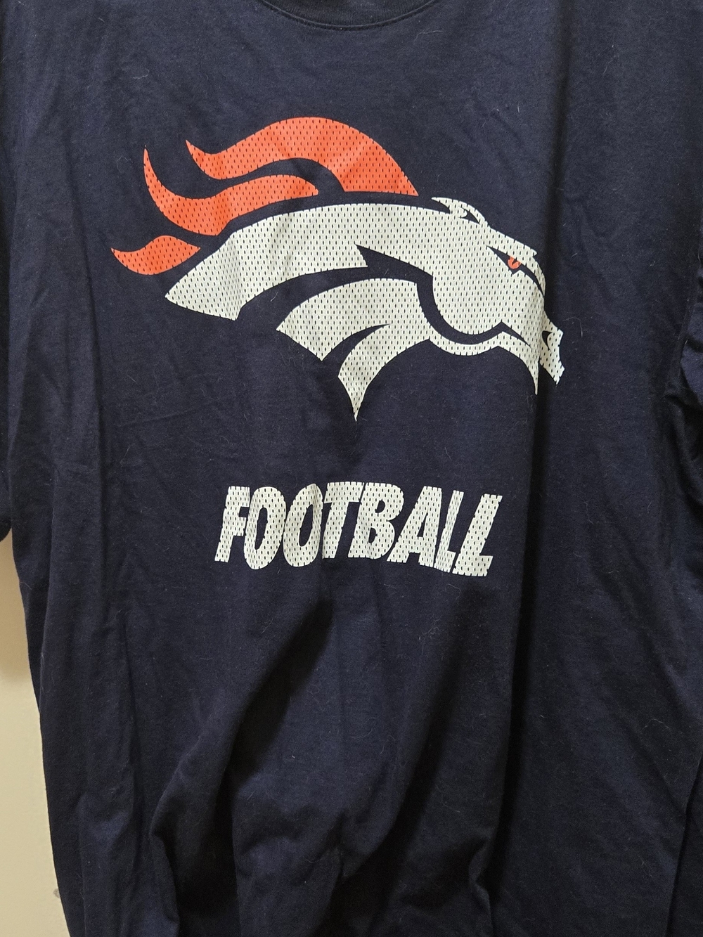 Nike Navy Blue Short Sleeve Football Graphic Tee with Orange and White Logo
